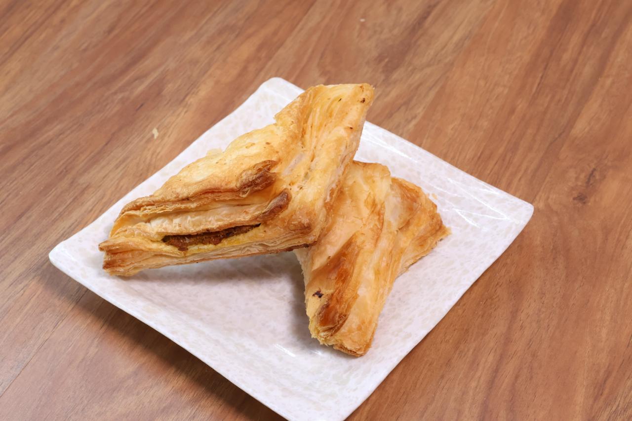 Golden flaky aloo patties, fresh from the oven